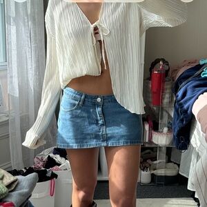 White pleated blouse with tie front